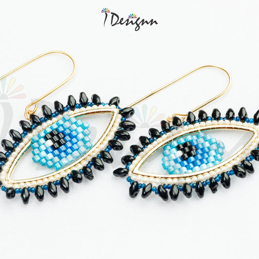 Beaded eye-shaped earrings with blue centers and black beads on a white background